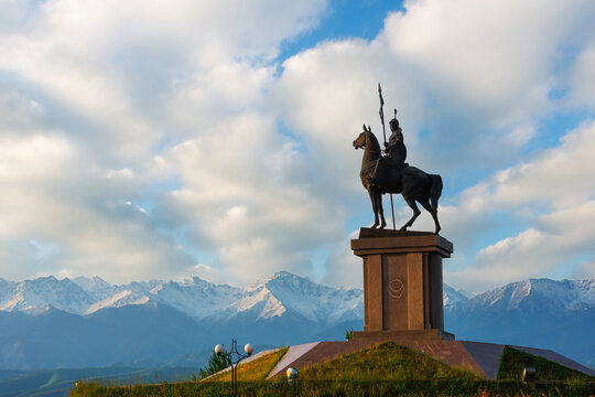 Almaty region, Kaskelen, Kazakhstan. Monument to the famous Kazakh commander of the first half of the 18th century Nauryzbay Batyr against the backdrop of the Trans-Ili Alatau mountains