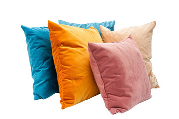 Collection of plush decorative pillows in teal, orange, pink, and cream colors isolated on black