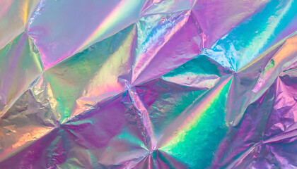Holographic iridescent color wrinkled foil. Real hologram background wrinkled abstract foil texture