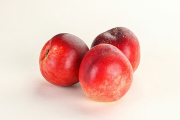 Ripe sweet juicy nectarines heap