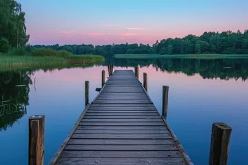Foto op Plexiglas A wooden dock extends over calm and clear lake waters surrounded by serene natural surroundings, A rustic, wooden fishing pier stretching out into a serene lake at dusk, AI Generated © Iftikhar alam