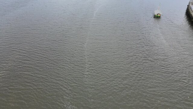 Beach in Jakarta, Indonesia, the water is not blue