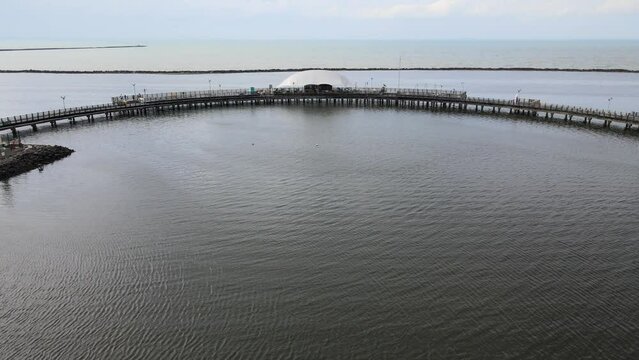 Beach in Jakarta, Indonesia, the water is not blue