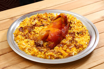 Arabic traditional mandi rice wooden background 
