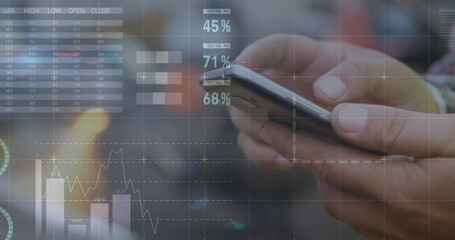 Image of hand of caucasian businessman using smartphone and financial data processing