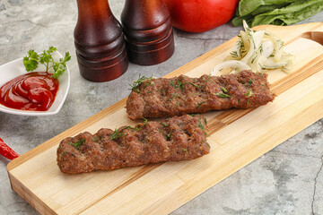 Kebab with beef served onion