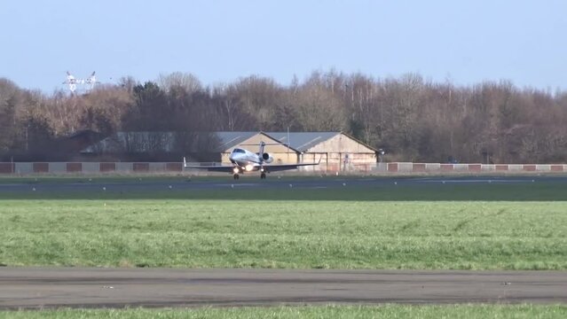Business Jet Landing at Regional Airport Private Business Corporate Executive Jet Landing at International Airport. Arrival Arriving