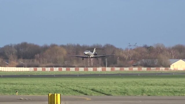 Private Jet Business jet Corporate Jet Executive Jet Taking Off Take off departure departing at Regional Small Airport Airfield