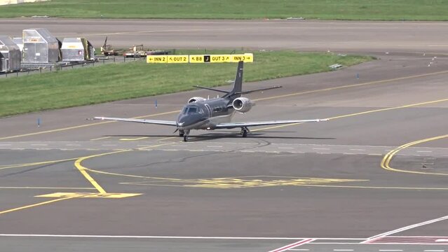 Grey Generic Business Jet Arriving at Airport