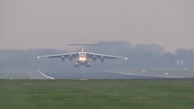 Heavy Old and Banned Russian Transport Airplane Aircraft IL-76 Taking off at Airport