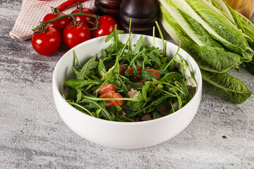 Salad with salmon and arugula