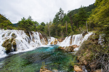 Mountain lake waterfall in Jiuzhaigou, Sichuan, China
