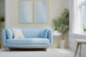 Blurred view of modern living room with sofa and soft bench. room interior with couch, armchair and...