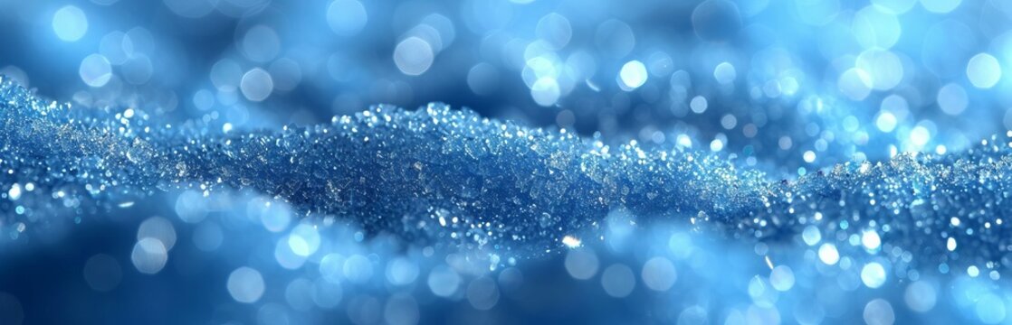 Abstract blue background with highlights and bokeh, reminiscent of frosty winter air or a starry sky.
Concept: background for events related to cold, space or the magic of winter. Banner, copy space