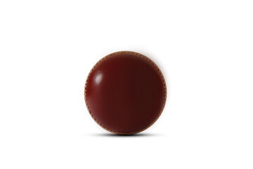 A regular red leather cricket ball on an isolated white background