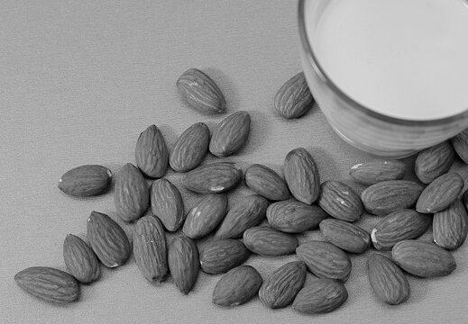 Almond milk with almond nuts on table no people stock image stock photo