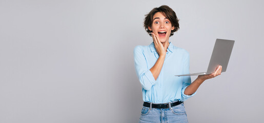 Banner photo of shocked excited attractive young brunette female in smart casual standing and...