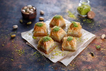 Turkish-style pistachio baklava with a glass of milk.