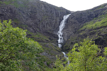 Fototapeta na wymiar waterfall in the mountains near Trollstigveien