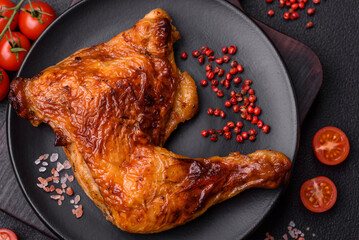 Delicious grilled chicken leg or quarter with salt and spices