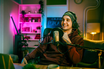 man shooting or streaming video podcast or vlogg blogger at studio
