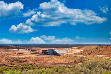 Open pit gold mine in the vast expanse of the Western Australian outback, close to the town of Mount Magnet
