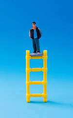 Man on ladder that takes him to the heights