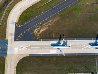 Aerial view of an airport. aerial view of airport terminal with parked airplanes