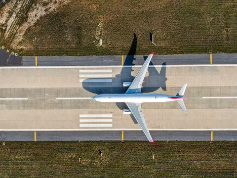 Aerial view of an airport. aerial view of airport terminal with parked airplanes