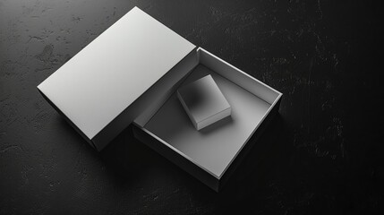 Sleek White Presentation Box on Textured Black Background for Luxury Packaging