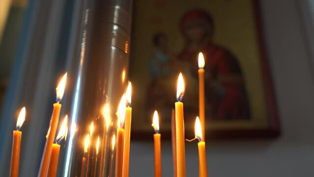 Lighted candles in an Orthodox church