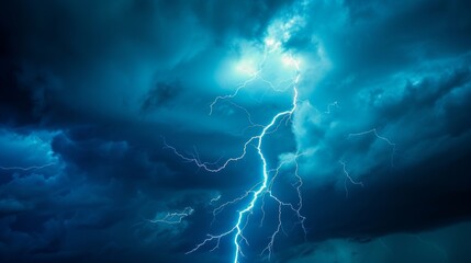 Capturing a single powerful lightning strike with a mysterious blue glow, this image exudes energy and intensity