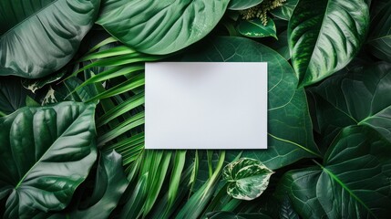 Close up a blank white paper card for mock up on green tropical leaves background. AI generated image