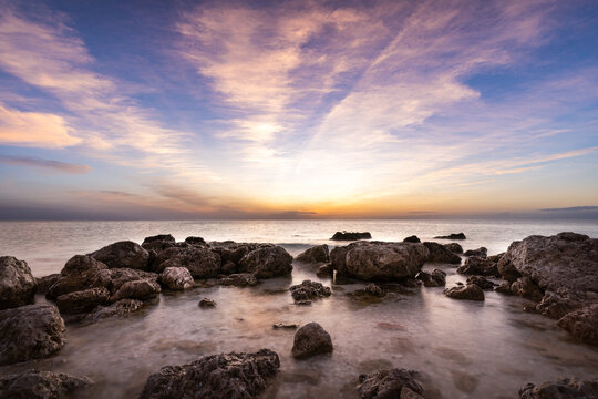 Beautiful warm sunset at Little Hickory Island Beach Park Bonita Springs, Florida