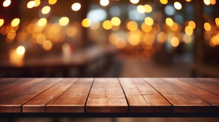 A wooden surface with a warm, blurred background of bokeh lights suggesting a cozy, festive, or...