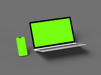 3D Render of laptop and phone with green screen on a dark background