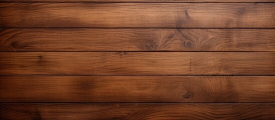 Fototapeta premium A close up of a brown hardwood floor with amber tints and shades, showcasing the natural beauty of the wood grain on a wooden plank