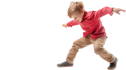 A young boy dressed in a red shirt and khaki pants explores the world around him