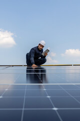 Engineer service check installation solar cell on the roof of factory. Engineers walking on roof...