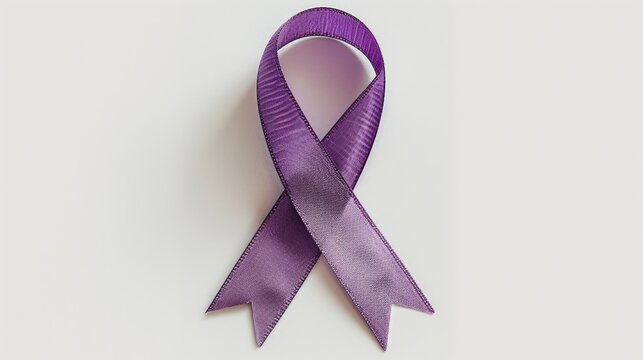 A purple ribbon on a white surface