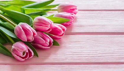 tulip border with copy space beautiful frame composition of spring flowers bouquet of pink tulips flowers on pink vintage wooden background