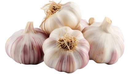 Obraz premium A close-up image showcasing several whole garlic bulbs with visible roots on a clean white background