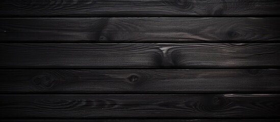A detailed shot of a dark grey hardwood wall, resembling an automotive tire tread pattern with parallel rectangles and shades of black - obrazy, fototapety, plakaty