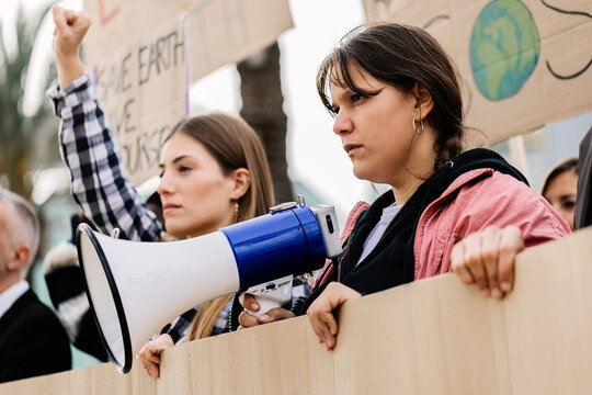 Group of people with placards and poster on global strike for climate change. Global warming and environment concept.