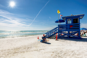 Lifeguard hut on Sunny Siesta Key Beach in a beautiful summer day with ocean and blue sky. - 760173545