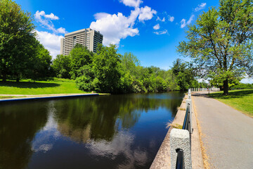 Rideau Canal runs through the heart of Ottawa with walkways,cycling and walking paths seen here on...