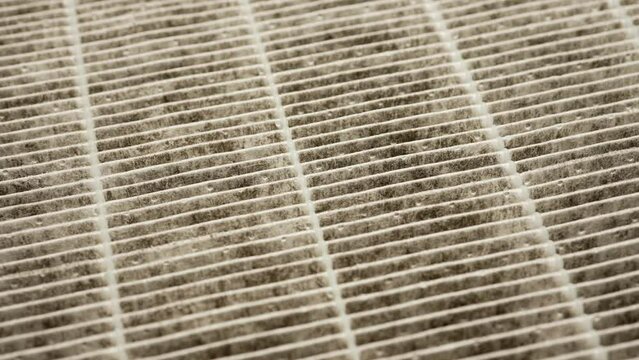 Air filter HEPA macro close up for removing fine particles and refresh indoor air. Air purifier filter for fresh healthy air, used for cleaning and removing allergen dust. Shallow depth of field.