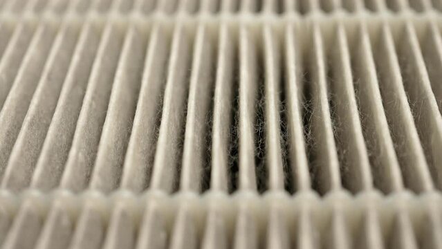 High efficiency particulate air filter focus tilt macro. HEPA air filter to stop spread of microscopic pollen grains and prevent pollen allergy. Filter for healing hay fever or allergic rhinitis.