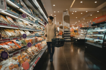 Woman Shopping for Groceries in Supermarket - 760207138