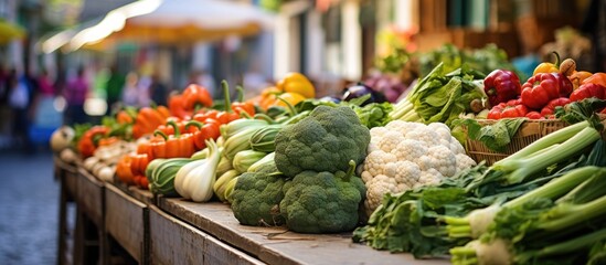 Bountiful Harvest: Colorful Fresh Vegetables Arranged on a Rustic Wooden Table